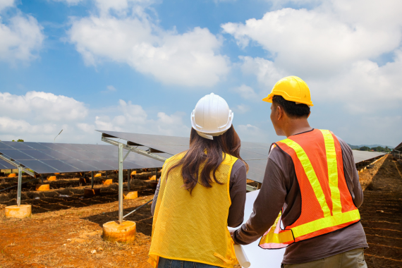 Two engineers identifying the site for Solar Installation