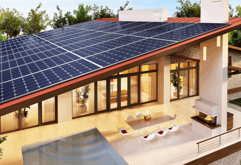 Solar panels installed on the dark-tiled roof of a modern, stylish residential home.