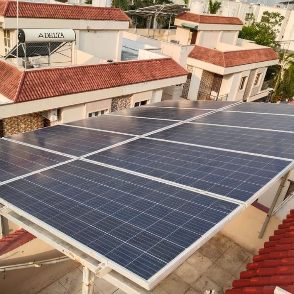 Energy-efficient home with solar panels installed on the roof