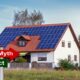 Traditional-style home with rooftop solar panels and a small red 'Myth' sign in the foreground