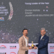 Chintan Mahida receiving the Young Leader of the Year 2025 Award on stage from a presenter at the Energy Excellence Awards.