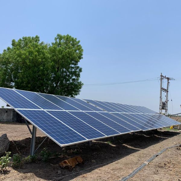 Solar panels installed on farmland for powering irrigation systems